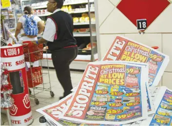 ?? Picture: Bloomberg ?? BARGAINS GALORE. Shoprite promises shoppers great deals. It seems the bargains are not to be found in shopping trolleys only: former CEO Whitey Basson’s R18-billion share buyback has shocked shareholde­rs.