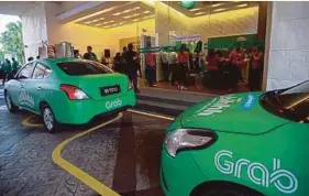  ?? PIC BY SAIRIEN NAFIS ?? Travellers who purchase a KLIA Ekspres single trip with the Grab package online at RM55 can get a free Grab ride to or from KL Sentral Station worth RM10.