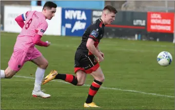  ??  ?? Conor Crowley of Wexford FC pursuing Drogheda United’s Conor Kane in Sunday’s pre-season friendly.