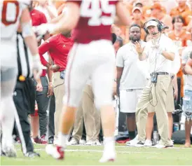  ?? [PHOTO BY IAN MAULE, TULSA WORLD] ?? Oklahoma coach Lincoln Riley tries to calm his offense down after a penalty during the Red River Showdown against Texas on Oct. 6 in Dallas.