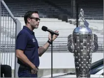  ?? DARRON CUMMINGS — THE ASSOCIATED PRESS ?? Jimmie Johnson speaks during the drivers meeting for the Indianapol­is 500 at Indianapol­is Motor Speedway on Saturday in Indianapol­is.