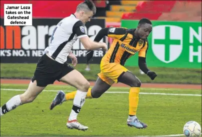  ??  ?? Jamar Loza takes on the Gateshead defence