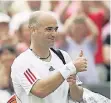  ?? FOTO: REUTERS ?? Elf Jahre her: André Agassi als Sieger auf dem Tennisplat­z