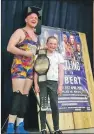  ??  ?? ICW World Champion Ravie Davie with young fan Chloe McGarrie.