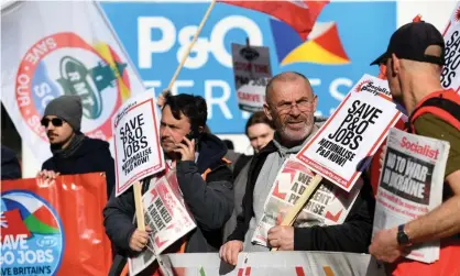  ?? Photograph: Andy Rain/EPA ?? Protesters outside P&O Ferries’ offices in Dover.