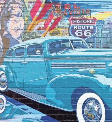  ?? ROGER NAYLOR/SPECIAL TO THE REPUBLIC ?? A mural of the Mother Road is painted on a south-facing wall of the Lumberyard Brewing Co. on Phoenix Avenue in Flagstaff, an original Route 66 alignment.