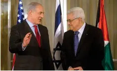  ?? (Reuters) ?? PRIME MINISTER Benjamin Netanyahu speaks with PA President Mahmoud Abbas before their meeting in Jerusalem on September 15, 2010.