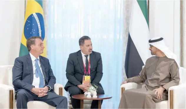  ?? WAM ?? ↑
Sheikh Mohamed Bin Zayed Al Nahyan holds talks with Jair Bolsonaro at the Al Shati Palace on Monday.