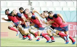  ?? (AP) ?? England rugby team players sprint during training at the Kobe Misaki Stadium during the
Rugby World Cup in Kobe, western Japan on Sept 25.