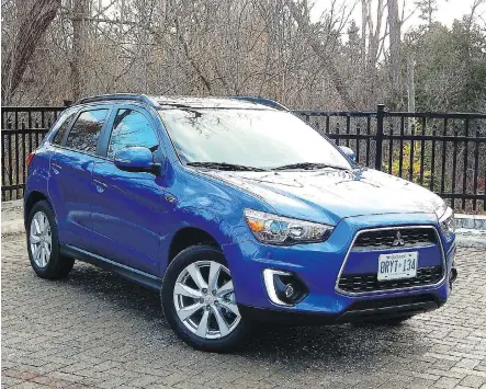  ?? PHOTOS: BRIAN HARPER/ DRIVING ?? The 2015 Mitsubishi RVR 2.4 GT AWC has more zip than previous models, but the interior could use an upgrade.