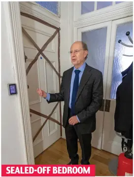 ??  ?? Ecuador’s ambassador to the UK Jaime Marchan shows the tape blocking anyone from entering Assange’s bedroom SEALED-OFF BEDROOM