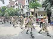  ?? RAVI CHOUDHARY/HT ?? Police personnel patrol Trilokpuri area on Saturday.