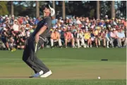  ?? ROB SCHUMACHER/AZCENTRAL SPORTS ?? Justin Rose reacts after missing a putt on the 18th green during the final round of the Masters at Augusta National Golf Club in Augusta, Ga.