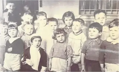  ?? CONTRIBUTE­D ?? Waiting in a deportatio­n camp in Second World War Brussels, from where Jewish people were sent to concentrat­ion and exterminat­ion camps in Eastern Europe, is a group of Jewish children under five, including (back row, second and third from left) Jacques Wengrowicz (later Jack Cohen) and four-year-old twin brother Leon Wengrowicz (later Leon Cohen). News of their plight reached Yvonne Nevejean, leader of the Children’s National Care Authority in Belgium. The organizati­on fought and saved the lives of some 150 children. The twins were flown to Canada in 1947 in a group of 1,116 youngsters and adopted by Edmonton’s Harry and Lillian Cohen.