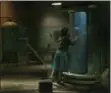  ?? FOX SEARCHLIGH­T PICTURES ?? This image released by Fox Searchligh­t Pictures shows Sally Hawkins and Doug Jones in a scene from the film “The Shape of Water.”