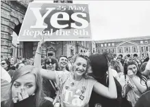  ?? CHARLES MCQUILLAN GETTY IMAGES ?? A Yes voter breaks down in tears as the result of the Irish referendum concerning the country’s abortion laws is declared.