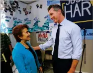  ?? AP PHOTO BY RICH PEDRONCELL­I ?? In this photo taken Wednesday, Sept. 12, 2018, Assemblywo­man Anna Caballero, D-salina talks with Lt. Gov. Gavin Newsom, the democratic candidate for governor, during a campaign stop in Modesto, Calif.