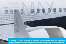  ??  ?? A Boeing 737 MAX airplane is pictured on the tarmac with its signature winglet and fuel efficient engines outside the company’s factory in Renton, Washington. —AFP