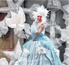  ?? PHOTO: PETER MCINTOSH ?? Snow princess . . . Midwinter Carnival performanc­e coordinato­r Rochelle Brophy is dressed in a carnival costume and surrounded by lanterns.