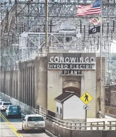  ??  ?? The Conowingo Dam is a key part of conservati­on efforts on the Potomac, but the reservoir behind it has filled with sediment much faster than expected. — Washington Post photo by Bill O’Leary