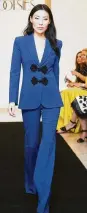  ??  ?? A signature Andrew Gn evening suit