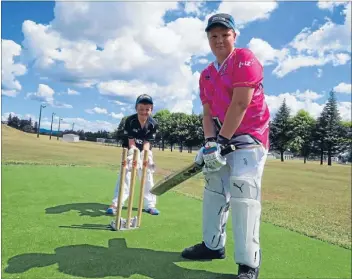  ??  ?? BOWLED OVER: Hamish King, back, and Ryan Hall are stoked they will be able to stay in Tokoroa for cricket thanks to a new wicket.