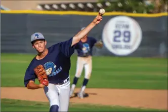  ?? Austin Dave/The Signal (See additional photos on signalscv.com) ?? Saugus’ Jonathan Bahr pitches during a home game against Saugus. The teams tied in the eighth inning, 12-12.St.FrancisHig­h School on Monday at