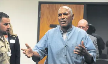  ?? AP ?? Former NFL star OJ Simpson reacts after learning he was granted parole at the Lovelock Correction­al Centre on Thursday.