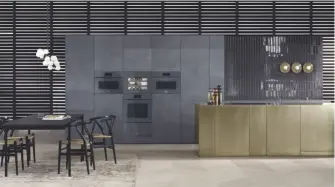  ??  ?? LEFT TO RIGHT Miele’s Artline kitchen seamlessly integrates appliances into kitchen cabinets; De Dietrich’s cooking system is space-saving and multifunct­ional