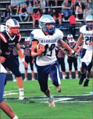  ?? FRANK CROWE / For the Calhoun TImes ?? Gordon Central’s David Lindsay (49) carries the ball during the first half of last Friday’s 35-7 loss at Haralson County.