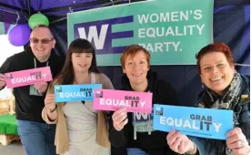  ?? Picture: Steve Smyth ?? Jon Skeet, Olivia Hunter, Louise Timlin and Charlotte Davis on the Women’s Equality Party Stall on Wokingham Market on Saturday.