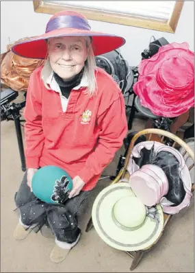  ?? PHOTO BY FRAM DINSHAW ?? Sandra Guadagni sits with a small portion of her hat collection. She hosted an event on Saturday, May 19, for people to watch the wedding of Prince Harry and Meghan Markle.