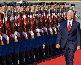  ?? RISTO BOZOVIC / ASSOCIATED PRESS ?? Vice President Mike Pence attends a welcome ceremony Tuesday at Golubovici Airport near Podgorica, Montenegro. Pence, who has visited Estonia and Georgia on his tour, will attend the Adriatic Charter Summit in Montenegro.