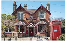  ?? ?? Business: Her post office and shop in rural Suffolk