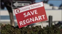  ?? KARL MONDON — STAFF ARCHIVES ?? Signs are posted outside Regnart Elementary School in Cupertino Nov. 10, protesting the school's planned closure.