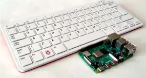  ??  ?? The latest incarnatio­n, the Pi 400, embodies a Pi 4 computer (pictured) within a keyboard.