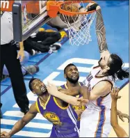  ?? AP/SUE OGROCKI ?? Oklahoma City Thunder center Steven Adams (12) dunks Tuesday over Golden State Warriors forward Harrison Barnes (40) and center Festus Ezeli (31) during the Western Conference finals in Oklahoma City.