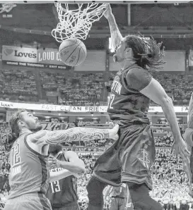  ?? Brett Coomer / Houston Chronicle ?? Rockets center Nene (42) seemed to be unfazed by his record-tying shooting performanc­e, connecting on all 12 of his attempts for a team-high 28 points in Game 4.