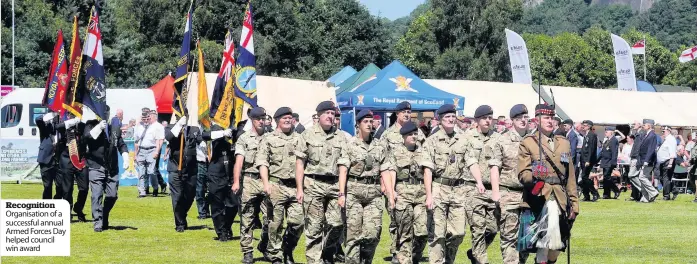  ??  ?? Recognitio­n Organisati­on of a successful annual Armed Forces Day helped council win award