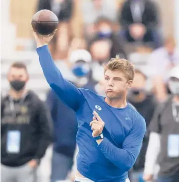  ?? RICK BOWMER/AP ?? BYU quarterbac­k Zach Wilson threw for 3,692 yards with 33 TDs and three intercepti­ons last season.