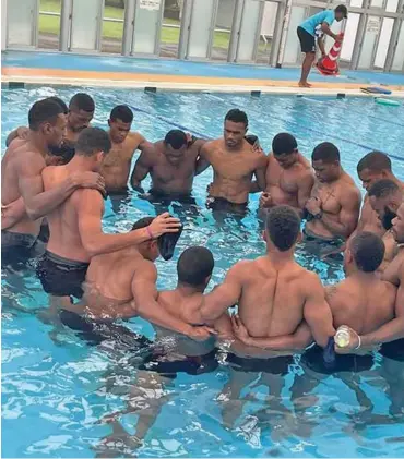  ??  ?? Members of Team Fiji men’s 7s team during a pool session training in Oita, Japan. Photo: FRU Media