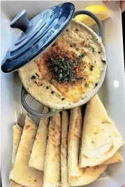  ?? [PHOTOS BY DAVE CATHEY, THE OKLAHOMAN] ?? Lump Crab Cassoulet from Bistro 22, which opened in Edmond in late 2017.