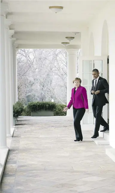  ?? Guido Bergman / Bundesregi­erung via Gett
y Images ?? German Chancellor Angela Merkel met with U.S. President Barack Obama on Monday.