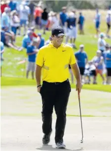  ?? AP PHOTO/CHRIS PEDOTA ?? Patrick Reed approaches the fourth green during the Northern Trust tournament Saturday at Liberty National Golf Course in Jersey City, N.J.