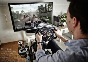  ??  ?? My gaming set-up provided a thrillingl­y realistic driving experience