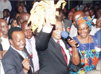  ??  ?? Acting President General Constantin­o Chiwenga (Retired) is flanked by Tobacco Industries Marketing Board chairperso­n Mrs Monica Chinamasa (right) and TIMB CEO Dr Andrew Matibiri (left) at the official opening of the selling season at Tobacco Sales...