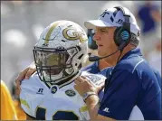  ?? HYOSUB SHIN / HSHIN@AJC.COM ?? Game analyst Dave Archer says Tech coach Paul Johnson and QB TaQuon Marshall share a similar approach to down-and-distance situations.