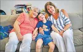  ?? Pablo Rodriguez ?? JOHN RODRIGUEZ, 6, kept asking about his grandmothe­r, Elena Blasser, right, and great-grandmothe­r, Elena Chavez: “Are they OK? Can we FaceTime them?”