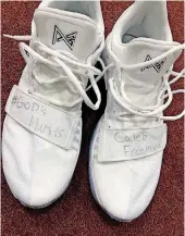  ?? [PHOTO PROVIDED] ?? During a Dec. 22, 2017,University of Oklahoma men’s basketball game in Norman, star point guard Trae Young wore athletic shoes featuring encouragin­g slogans for Caleb Freeman of Newcastle and his family.