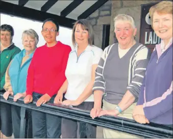  ??  ?? In 2011: Machrihani­sh Golf Club’s ladies competed in their annual Ladies’ Charity Open. Playing to raise funds for Bonnie Babies, they raised £230. Ladies’ captain Valerie MacKay thanked everyone who helped over the course of the day. Played in a Stableford format, the competitio­n was won by Mary MacIntyre, third right, and the scratch winner was Lindsay Ramsay, third left. They are pictured with the rest of the main prizewinne­rs.